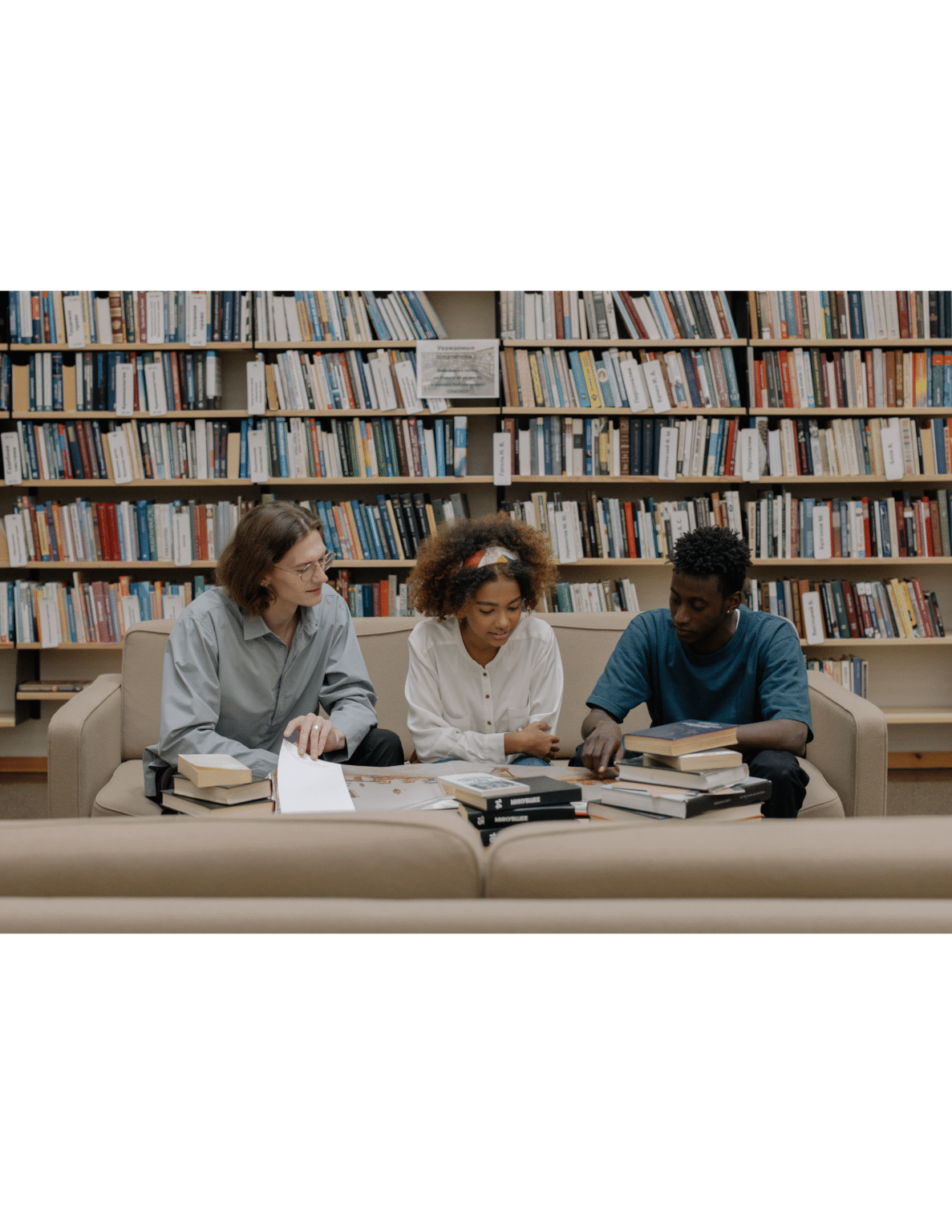 Student reading and writing during an English class